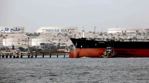 AFP File photo showing an Iranian tanker docked at a platform of the oil facility on Iran's Khark Island, in the Gulf (12 March 2017)